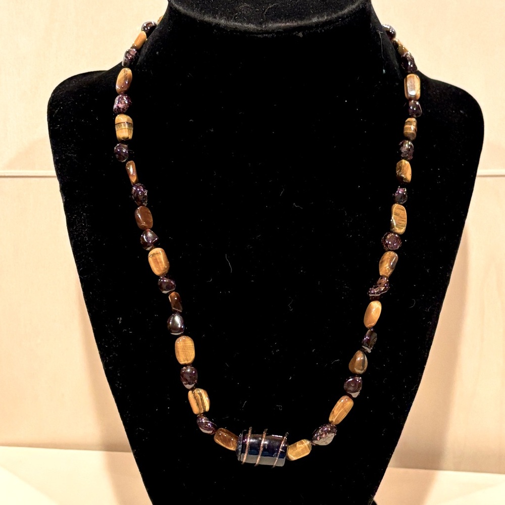 Natural Stone necklace 19 inches long with gold toned heart shape toggle clasp.